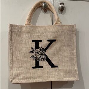Elegant Beige Tote Bag with Floral Initial Design